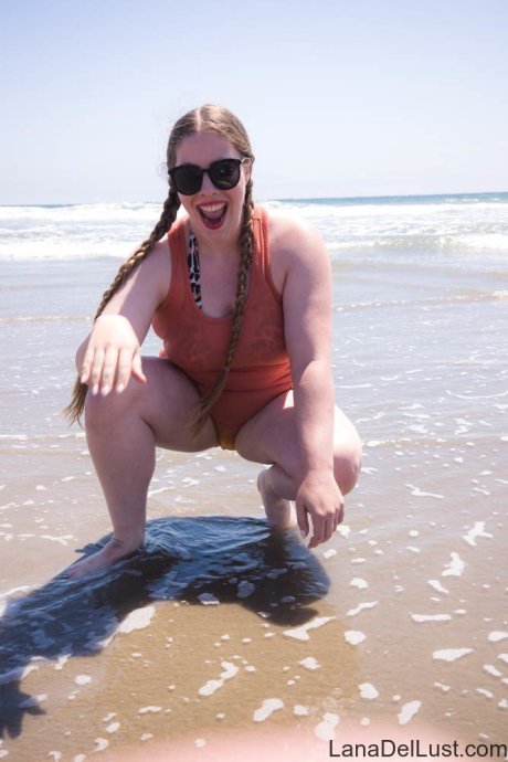 Chubby chick Lana Del Lust showing her big boobs on the beach