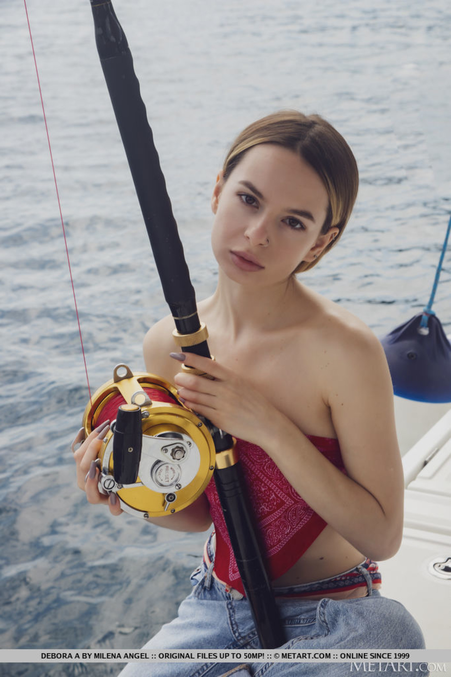 Skinny young girl Debora A gets naked while deep-sea fishing - Pichunter